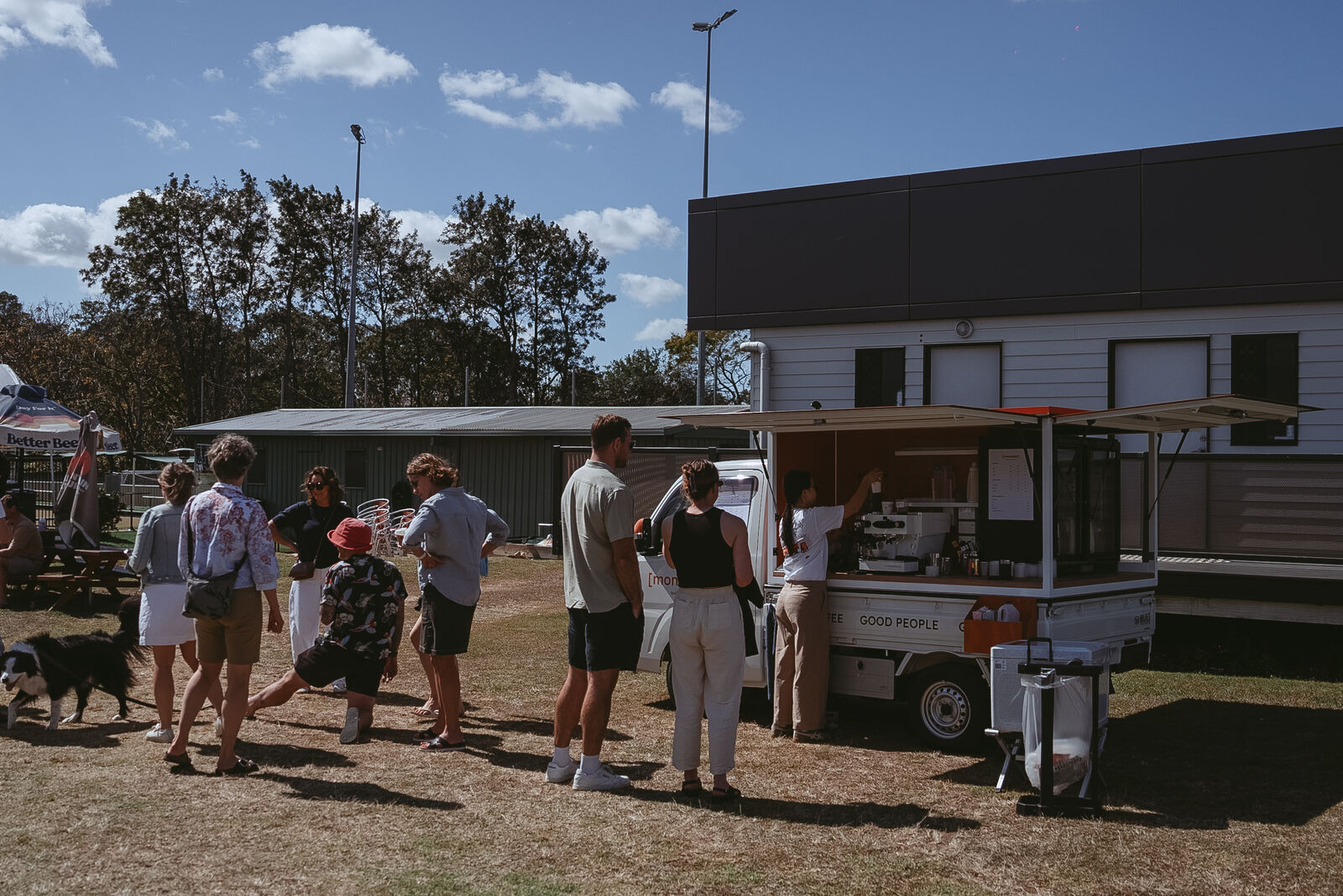 guests queuing at the [monomer] truck at a park event
